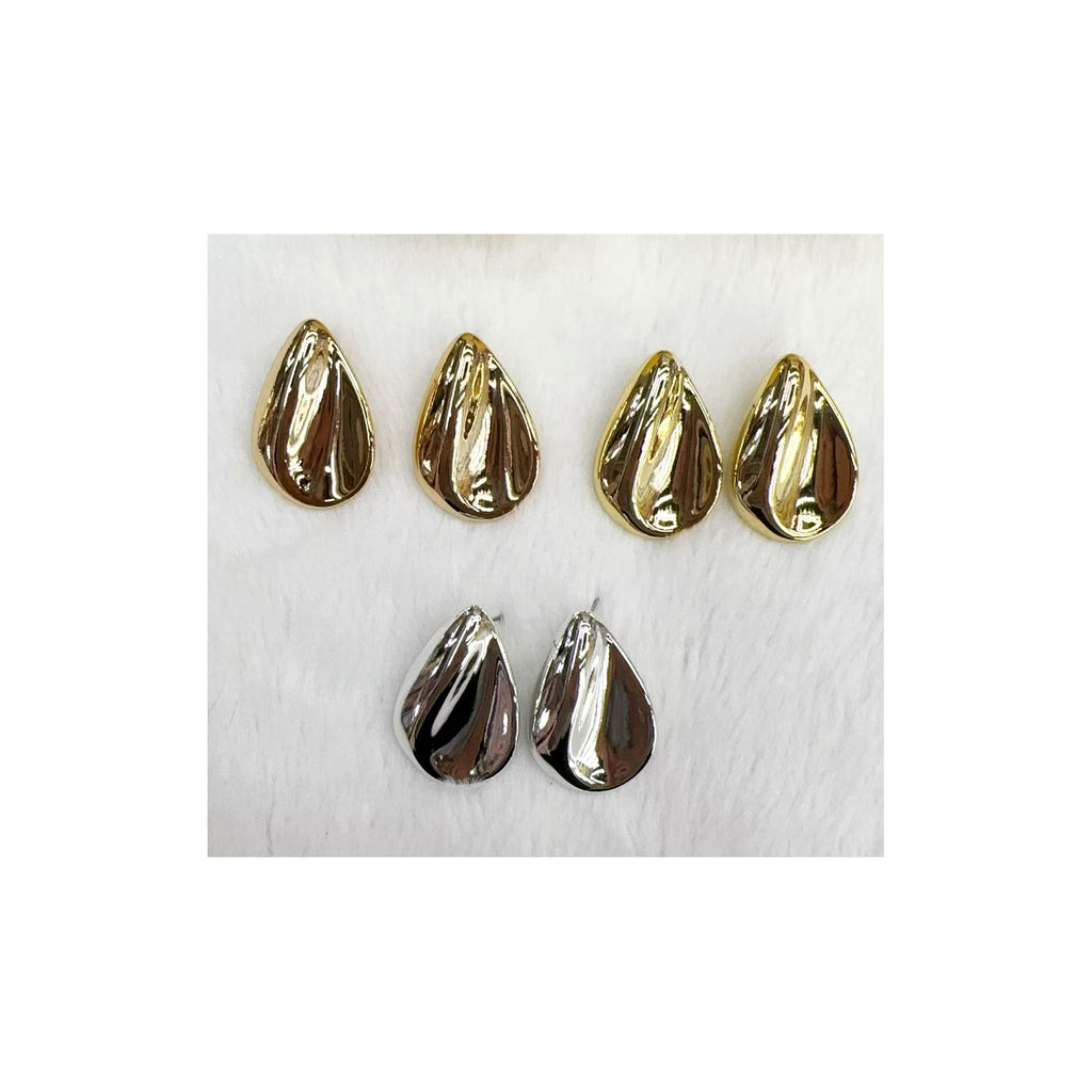 Darcy teardrop shell earrings on pure white background