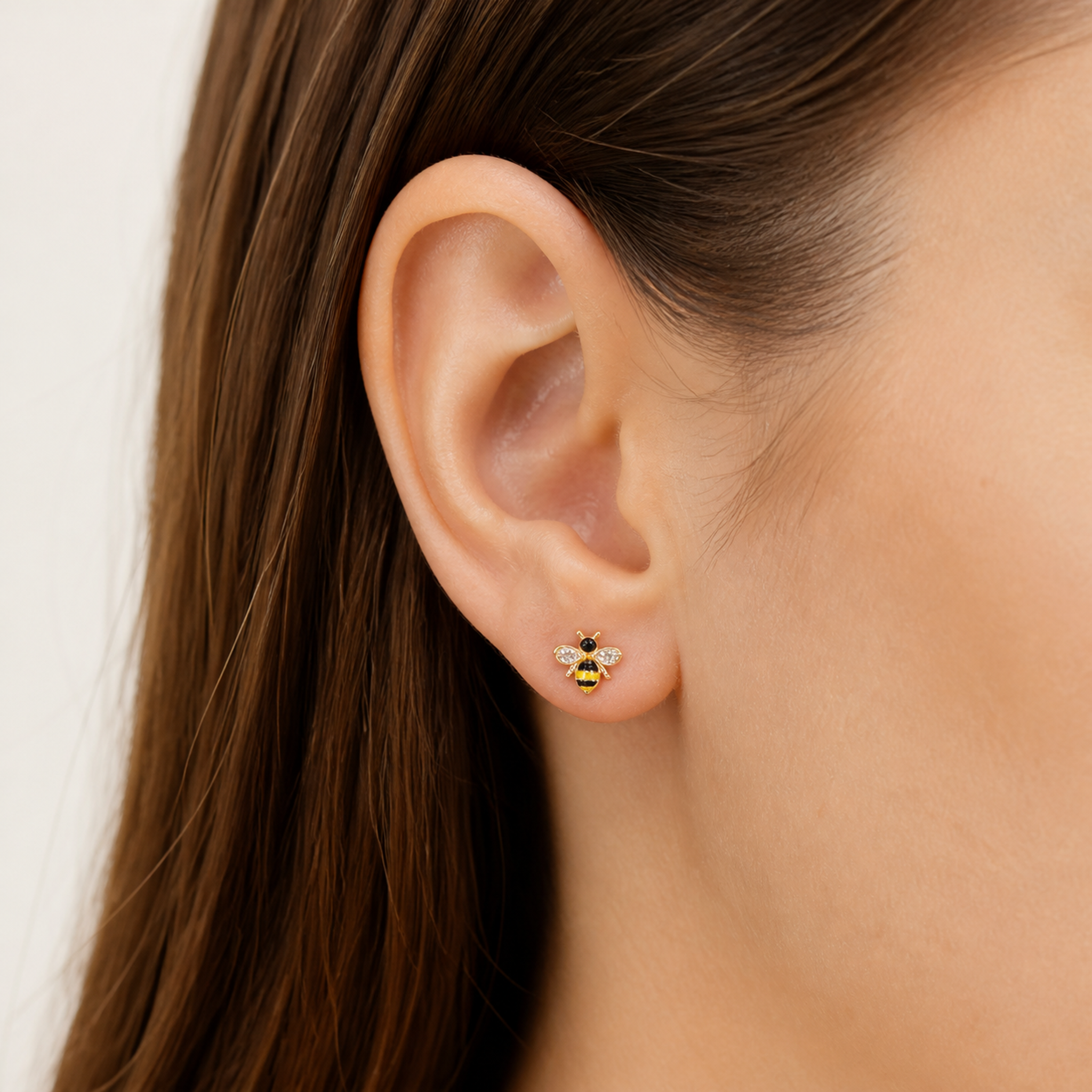 PF-TINY-HONEY-BEE-STUD-EARRINGS worn image